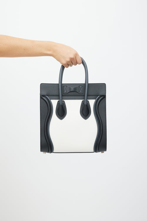 Celine White 
Black Leather Luggage Tote