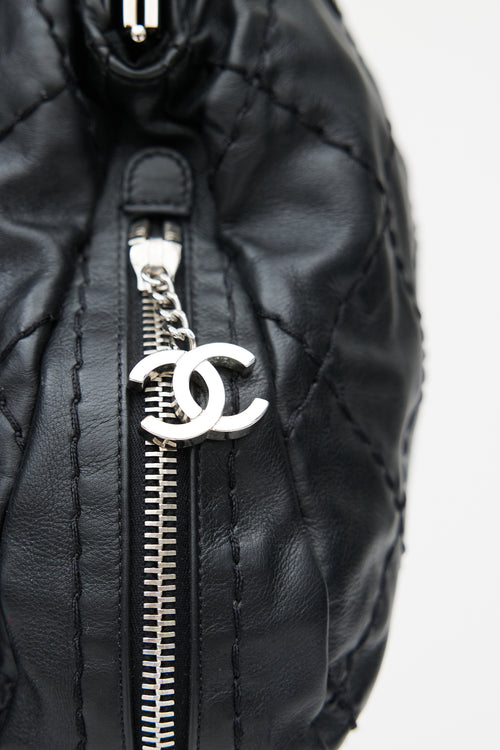 Chanel 2006 Black 
Silver Expandable Zip Around Leather Bag