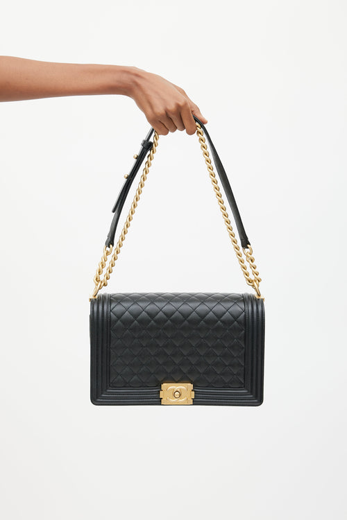 Chanel 2019 Black Caviar Leather 
Gold Large Boy Bag