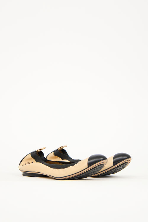 Chanel Beige 
Black Leather CC Ballet Flat