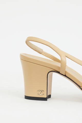 Chanel Beige 
Black Leather Slingback Pump