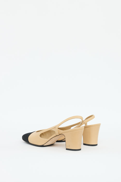 Chanel Beige 
Black Leather Slingback Heel