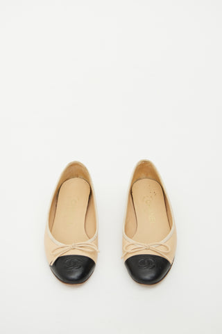 Chanel Beige 
Black Bow Ballet Flat