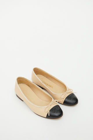 Chanel Beige 
Black Bow Ballet Flat