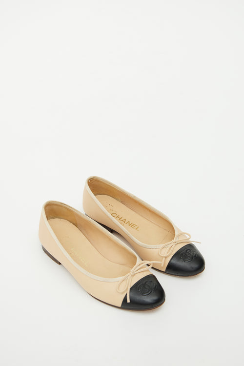 Chanel Beige 
Black Bow Ballet Flat