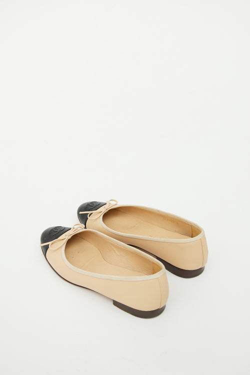 Chanel Beige 
Black Bow Ballet Flat