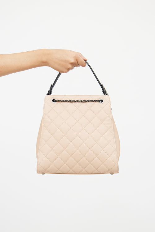 Chanel Beige 
Black Caviar Quilted Bucket Bag