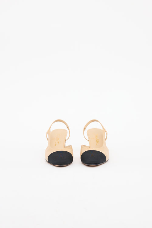 Chanel Beige 
Black Cap Toe Slingback Heel