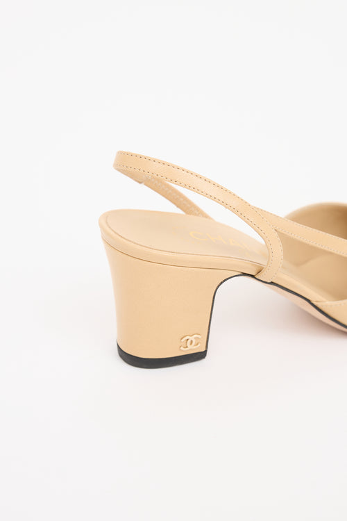 Chanel Beige 
Black Cap Toe Slingback Heel