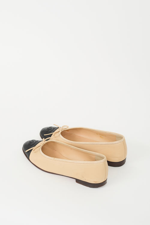 Chanel Beige 
Black Bow Ballet Flat