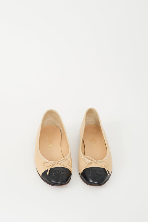 Chanel Beige 
Black Bow Ballet Flat