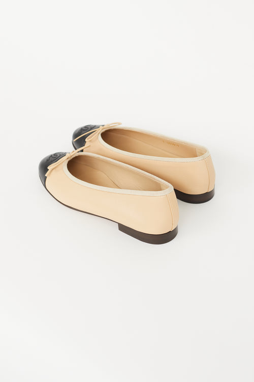 Chanel Beige 
Black Bow Ballet Flat