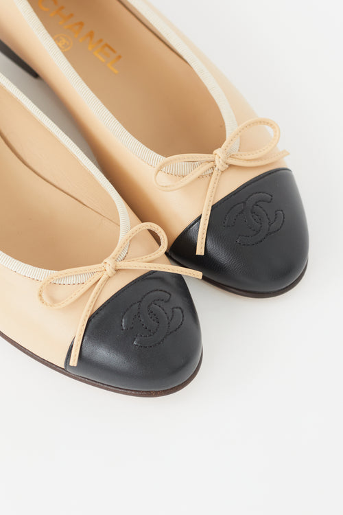 Chanel Beige 
Black Bow Ballet Flat