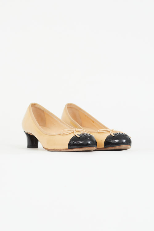 Chanel Beige 
Black Patent Bow Heel