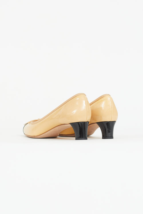 Chanel Beige 
Black Patent Bow Heel