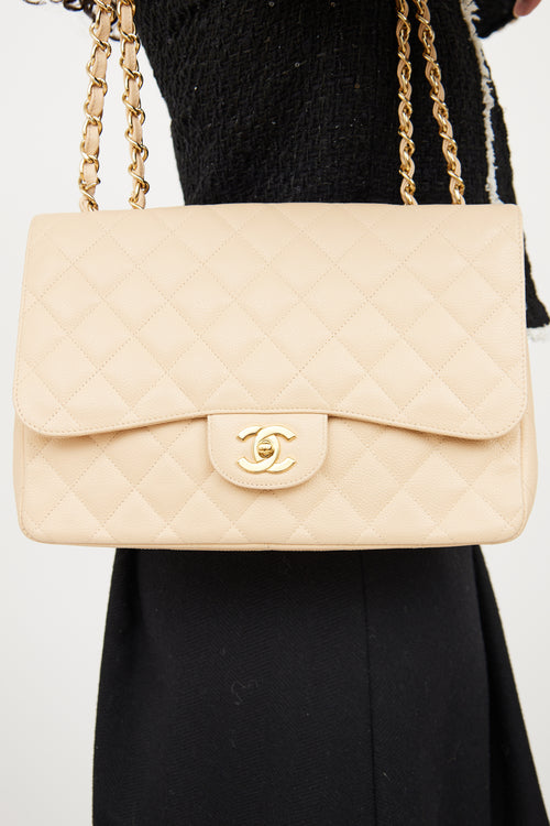 Chanel 2010 Beige Caviar Classic Single Flap Bag