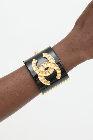 Chanel Black 
Gold Resin CC Wide Cuff Bracelet