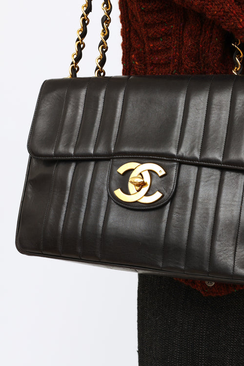 Chanel Black Vertical Quilt Lamkskin Flap Bag