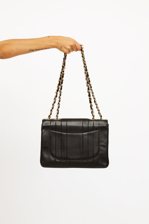 Chanel Black Vertical Quilt Lamkskin Flap Bag