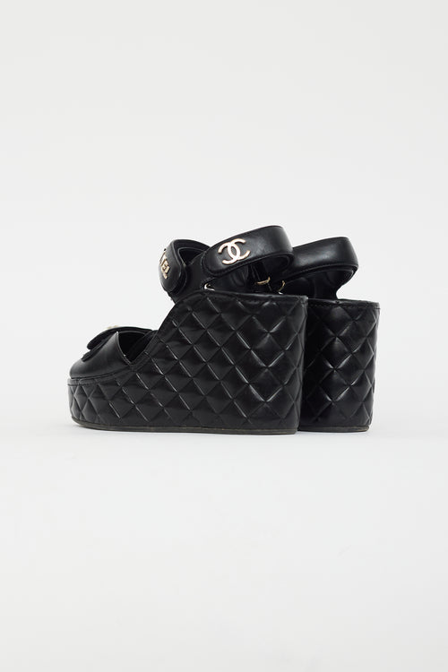 Chanel Black 
Gold Quilted Leather Wedge Sandal