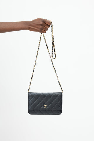 Chanel Black 
Gold Quilted Caviar Wallet On Chain