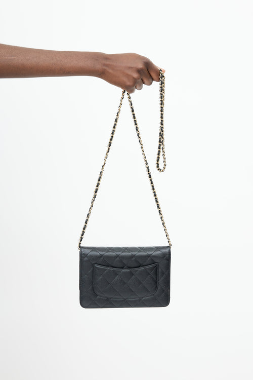 Chanel Black 
Gold Quilted Caviar Wallet On Chain