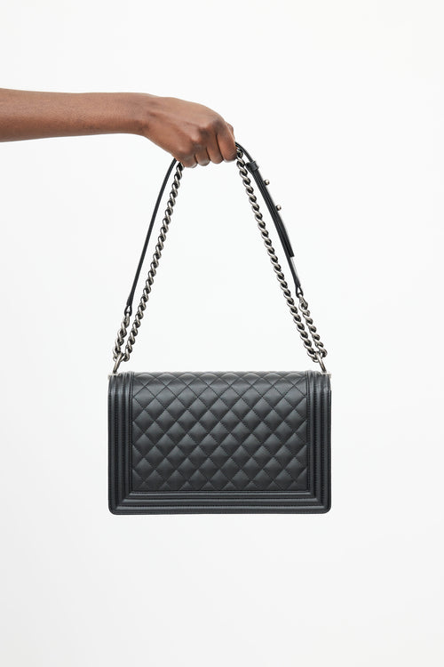 Chanel 2022 Black Quilted Caviar Leather Boy Bag