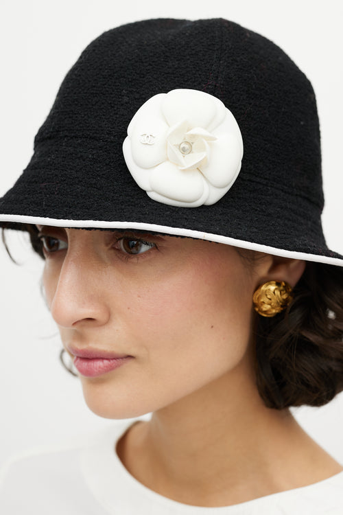 Chanel Black 
White Camellia Bucket Hat