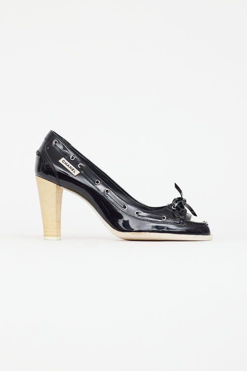 Chanel Black 
White Patent Leather Boat Shoe Pump