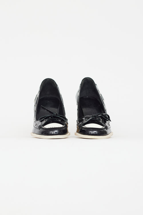 Chanel Black 
White Patent Leather Boat Shoe Pump