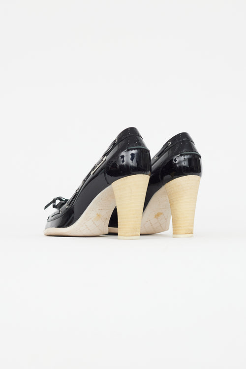 Chanel Black 
White Patent Leather Boat Shoe Pump