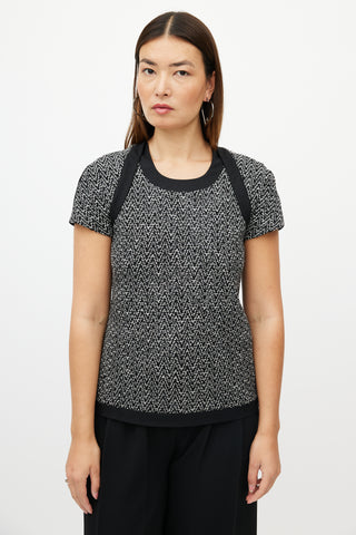 Chanel Black 
White Wool Herringbone Boucle Top