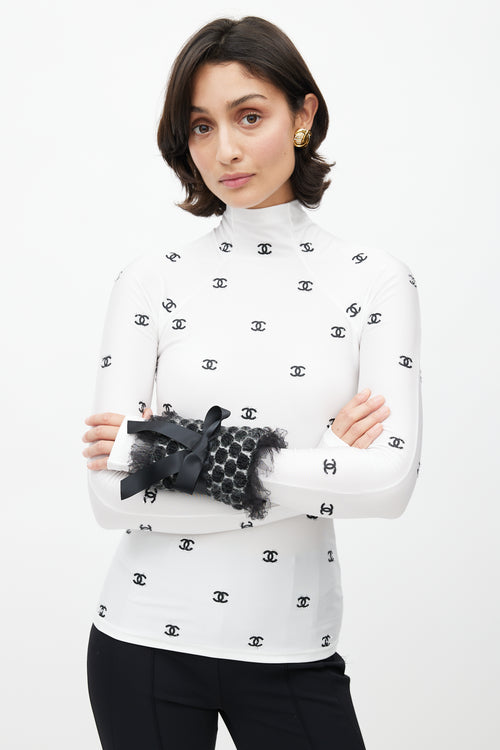 Chanel Black Wool Polka Dot 
Bow Arm Warmer