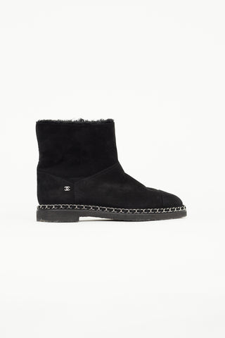 Chanel Black Suede 
Shearling Chain Ankle Boot