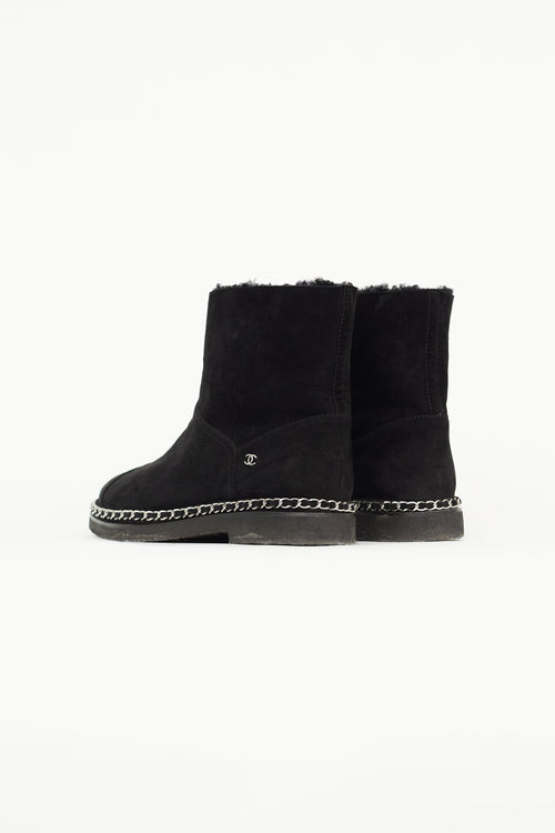 Chanel Black Suede 
Shearling Chain Ankle Boot