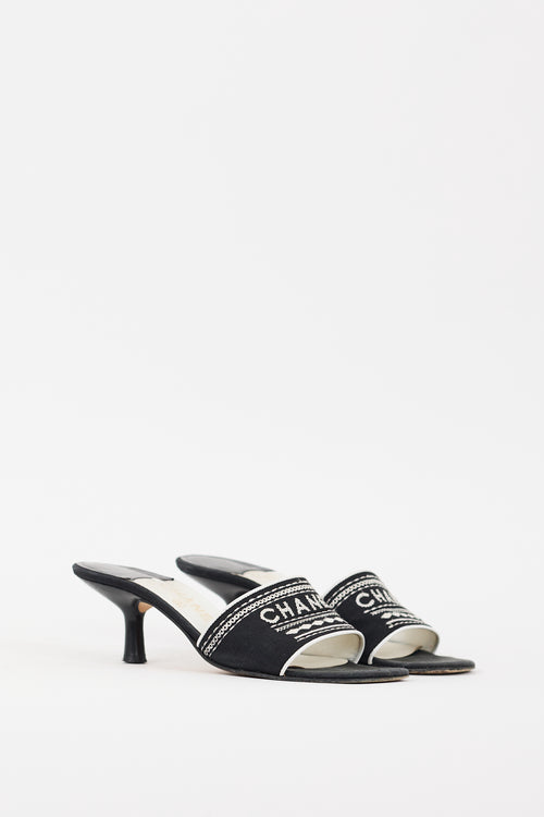 Chanel SS 2001 Black 
White Embroidered Logo Mule