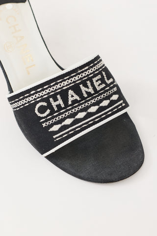 Chanel SS 2001 Black 
White Embroidered Logo Mule