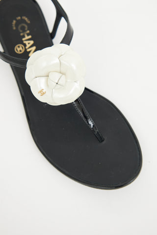 Chanel Black 
White Camellia T-strap  Sandal