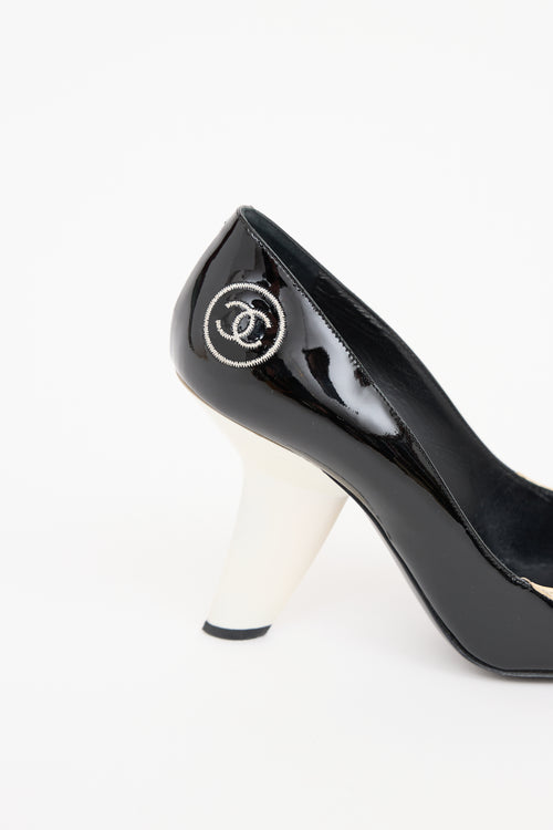 Chanel Black 
Cream Patent Cruise 2008 Pump Heel