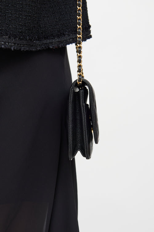 Chanel Black 
Gold Quilted Caviar Wallet On Chain