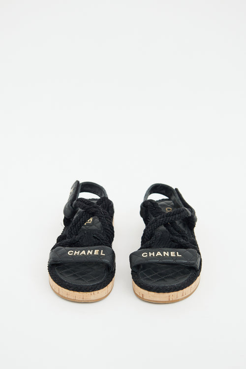 Chanel Black Leather 
Rope Logo Sandal