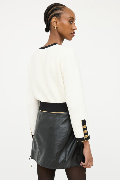 Chanel White 
Black Terry Crop Cardigan