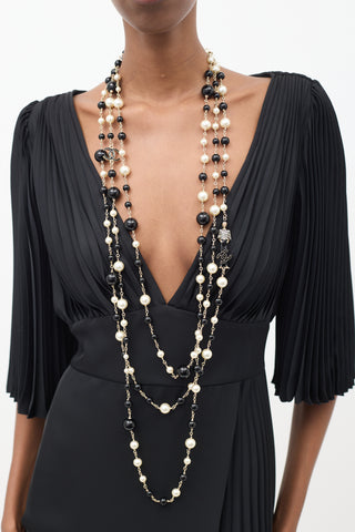 Chanel Cruise 2010 Black 
Cream Pearl Paris-Venice Charms Necklace