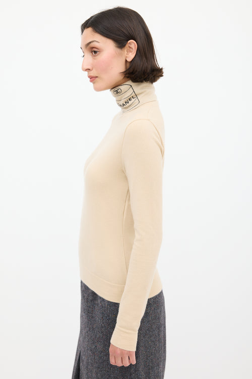 Chanel F/W 2004 Beige 
Black Cashmere Turtleneck