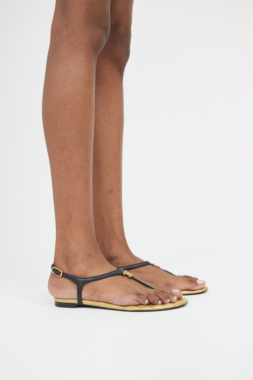 Chanel Gold 
Black Leather T-Strap Logo Sandal