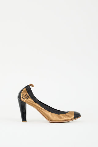 Chanel Gold 
Black Leather CC Stretch Pump