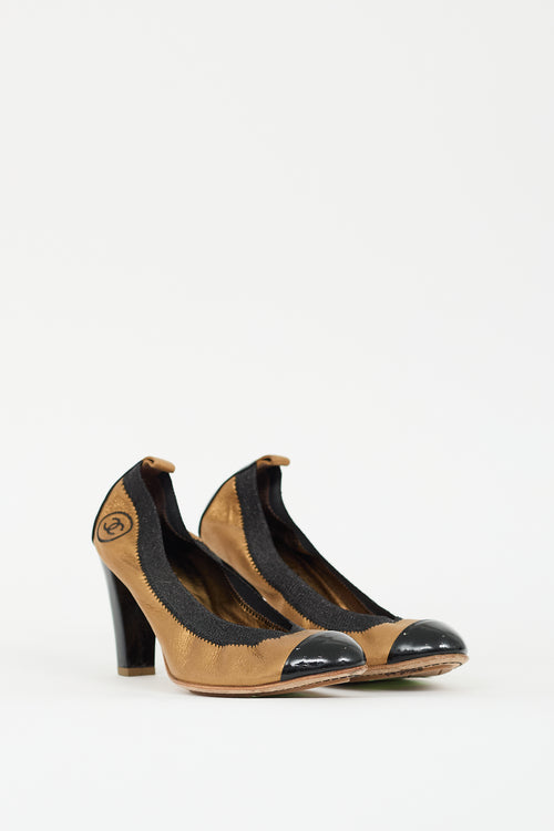 Chanel Gold 
Black Leather CC Stretch Pump