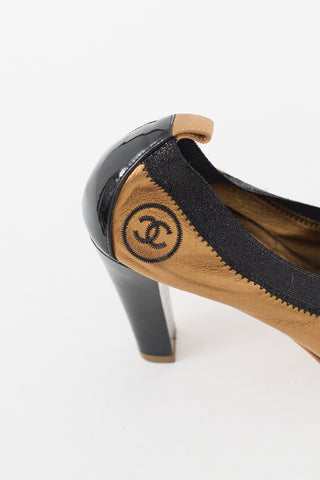 Chanel Gold 
Black Leather CC Stretch Pump