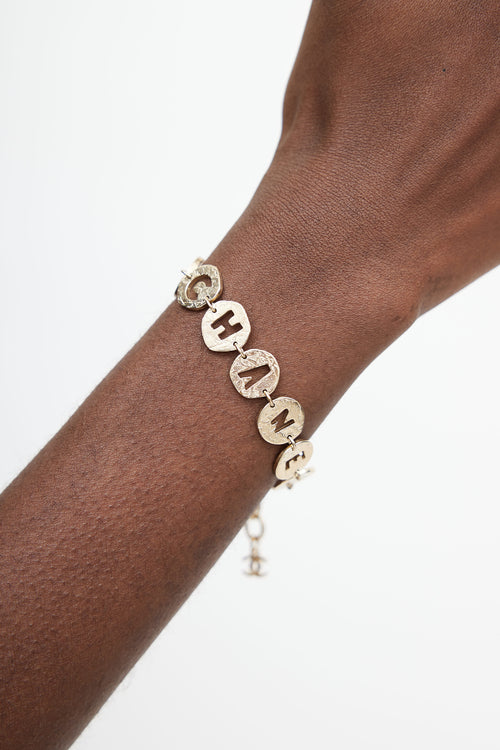 Chanel Gold 
Pearl Logo Bracelet