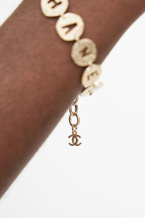 Chanel Gold 
Pearl Logo Bracelet